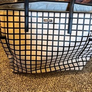 This is a brand new Kate spade diaper bag with handle and mat